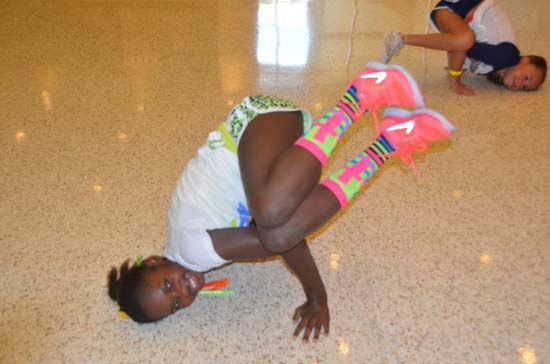 Two young dancers are lined up to audition for...